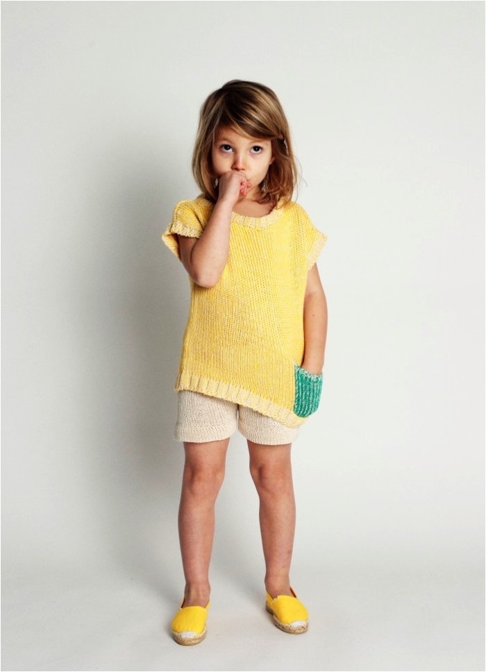 girl wearing cotton knit sweater yellow